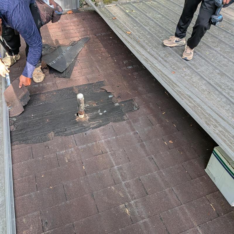 Metal roof shingles removal near vent pipe Metal roof shingles removal near vent pipe