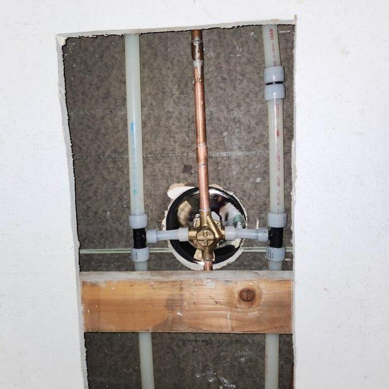Shower valve and piping with copper and PVC lines Shower valve and piping with copper and PVC lines