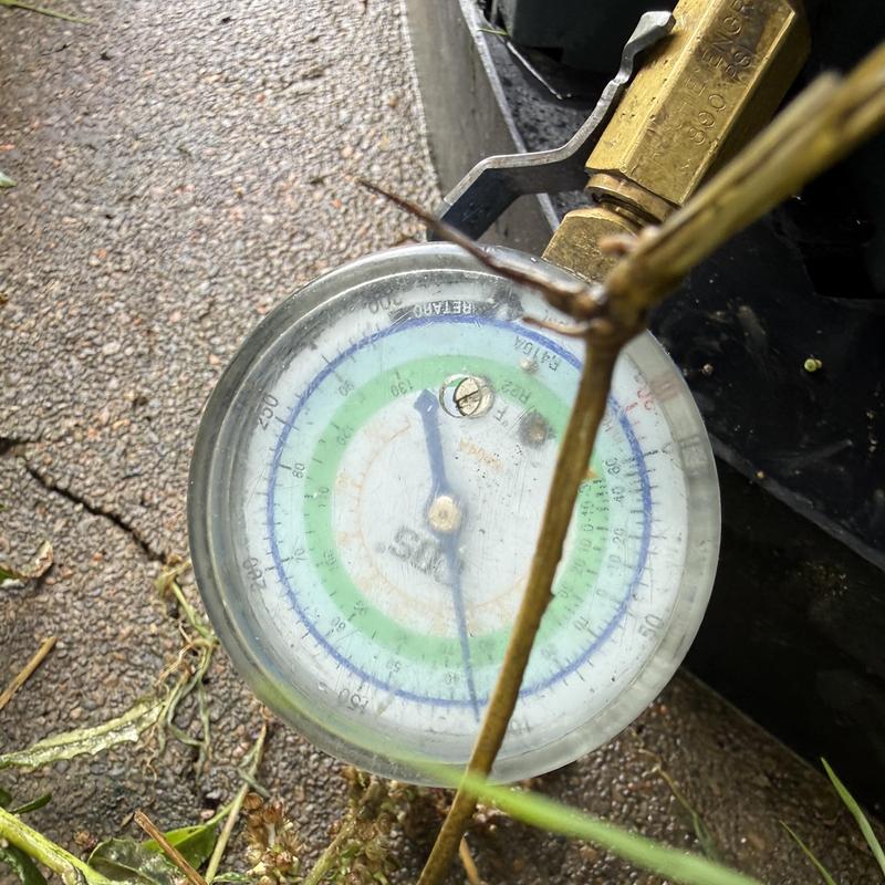 HVAC Freon pressure gauge on condenser unit HVAC Freon pressure gauge on condenser unit
