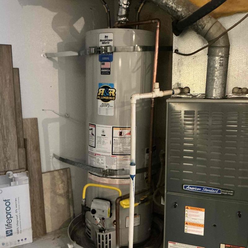 Water heater with new supply and gas lines installed