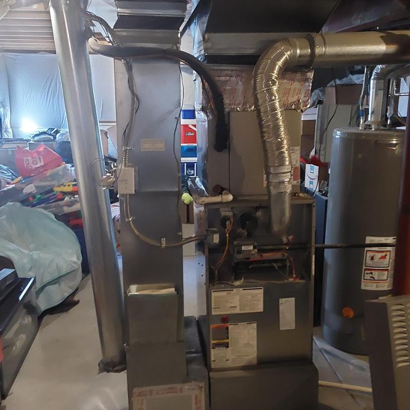 Carrier furnace with ductwork in basement utility room Carrier furnace with ductwork in basement utility room