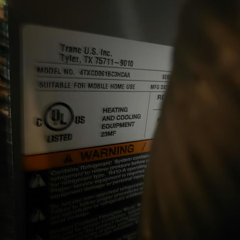 Heating and cooling equipment model label close-up Heating and cooling equipment model label close-up