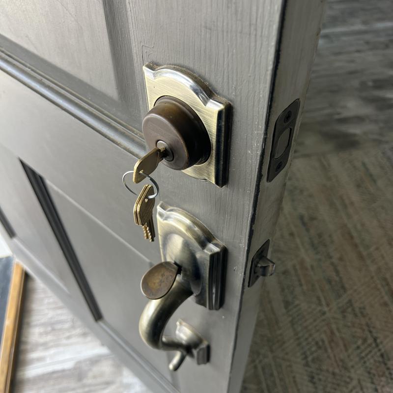 Deadbolt lock with keys in front door