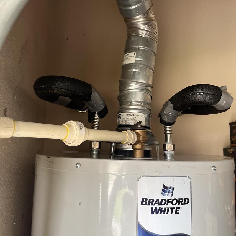 Bradford White water heater with piping and vent Bradford White water heater with piping and vent