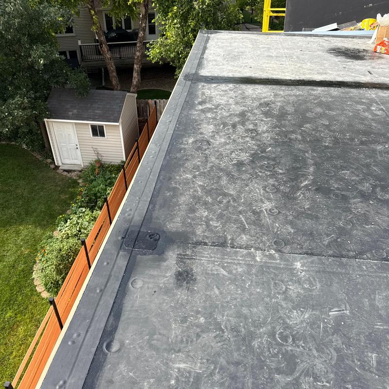 Carlisle Sure-Seal Kleen EPDM roof surface installation