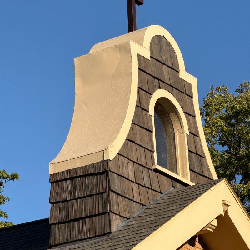 Brava Composite Cedar Shake shingles on roof tower Brava Composite Cedar Shake shingles on roof tower