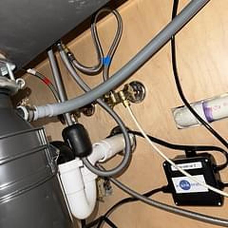 Dishwasher waterline connection under kitchen sink