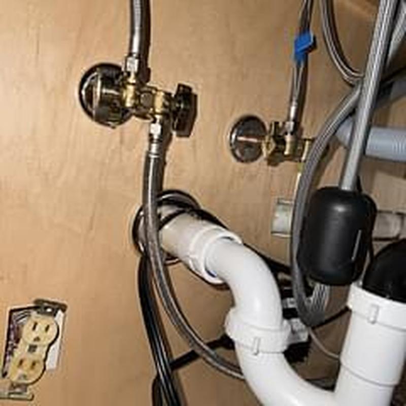 Dishwasher waterlines and drain pipe installation under sink