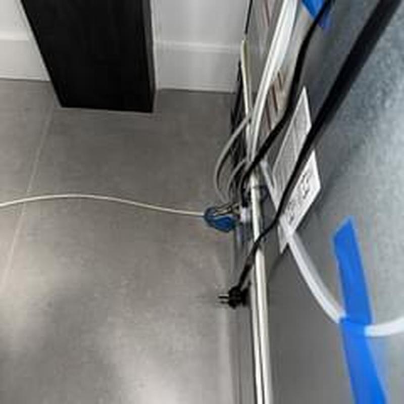 Dishwasher waterline connection with electrical cords