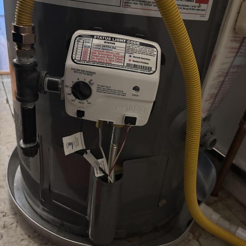 Gas water heater control valve and gas line connections Gas water heater control valve and gas line connections