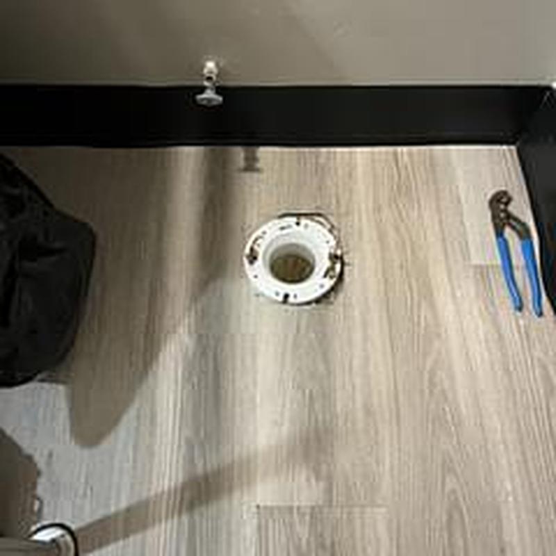 Toilet flange installation on bathroom floor