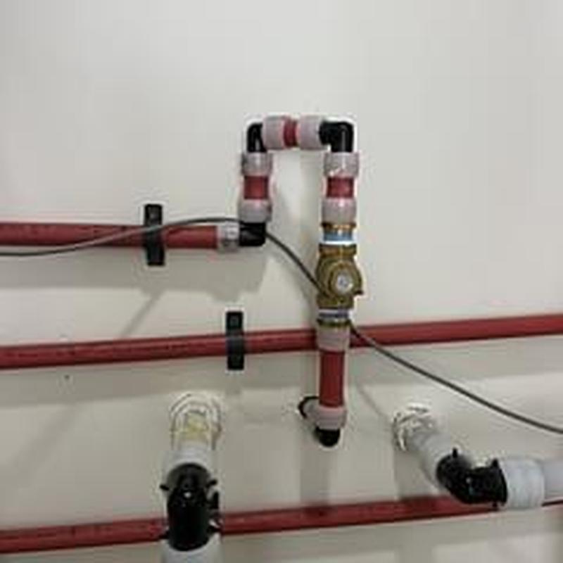 Recirculation line bleed port with ball valve installed