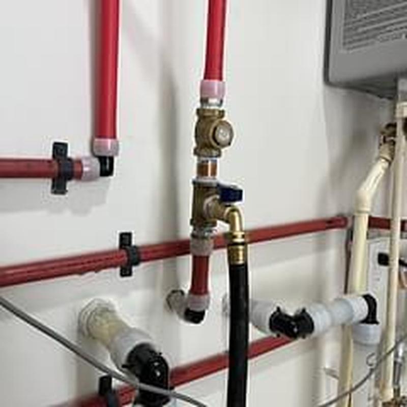 Recirculation line bleed port with ball valve installation