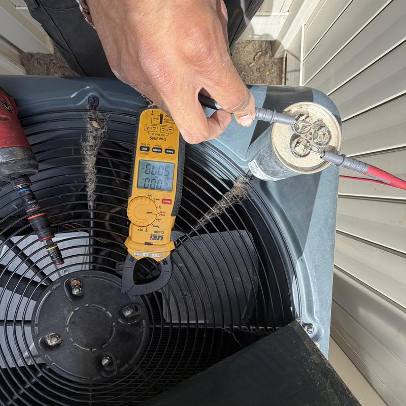 Air conditioner capacitor testing with multimeter probe Air conditioner capacitor testing with multimeter probe