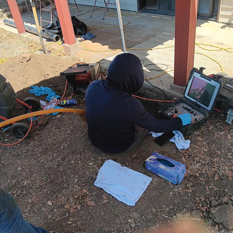 Trenchless sewer line inspection with robotic controls