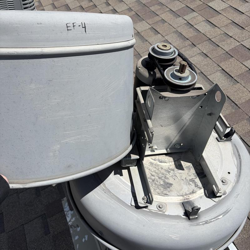 Swamp cooler motor mount and pulleys on rooftop Swamp cooler motor mount and pulleys on rooftop