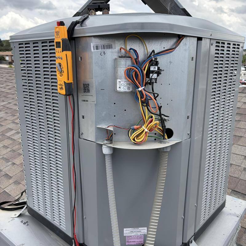 Air conditioner capacitor and wiring inspection on rooftop unit Air conditioner capacitor and wiring inspection on rooftop unit