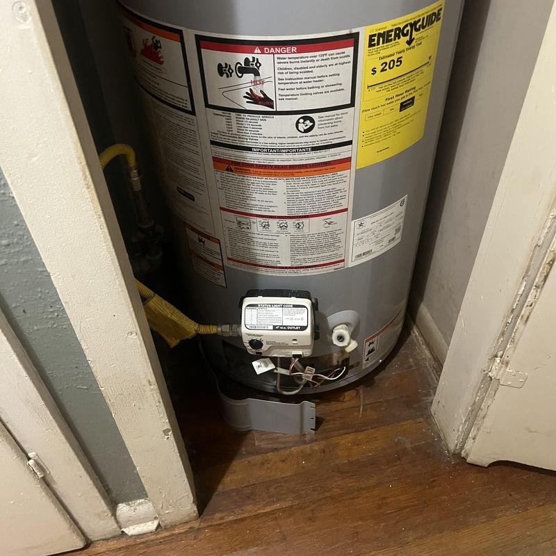 Water heater with pressure valve and energy guide label Water heater with pressure valve and energy guide label