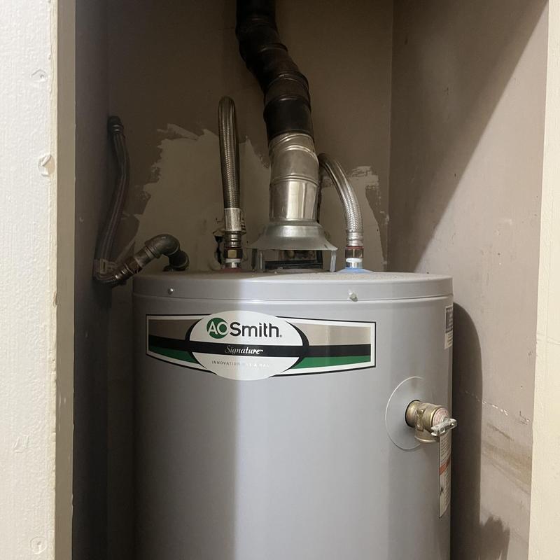 AO Smith water heater with vent pipes installed AO Smith water heater with vent pipes installed