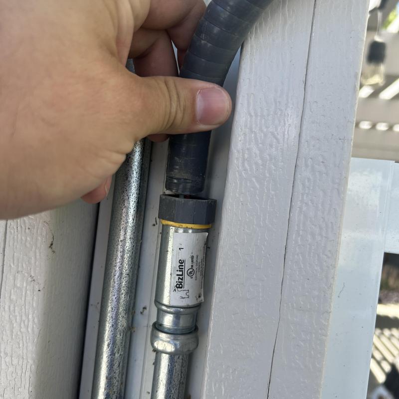 Electrical conduit fitting inspection near exterior wall Electrical conduit fitting inspection near exterior wall