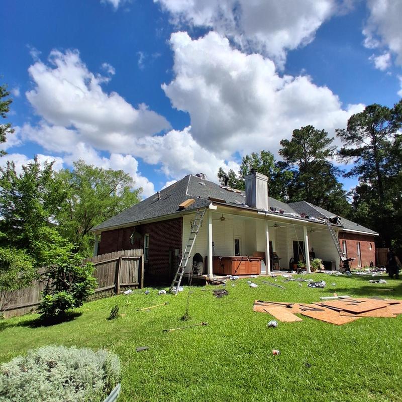 Roof shingles removal and replacement with deck repair