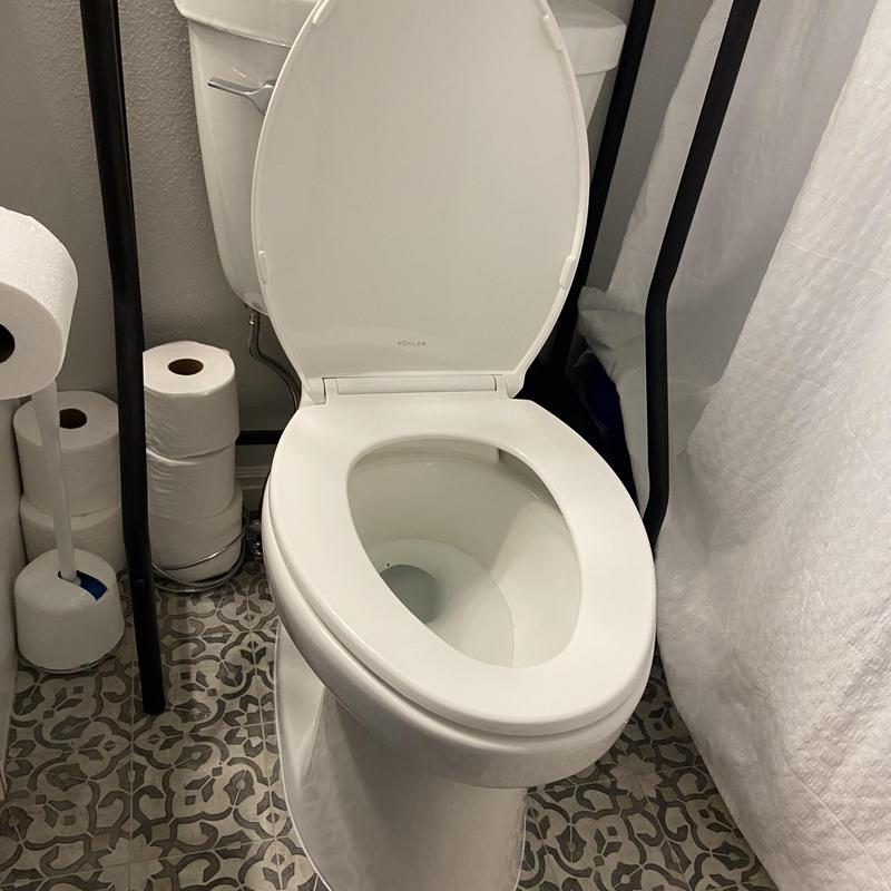 Toilet replacement with open seat in bathroom