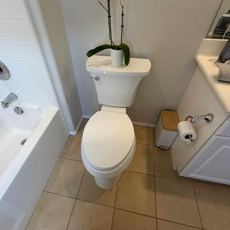 Kohler elongated toilet installed on tile floor