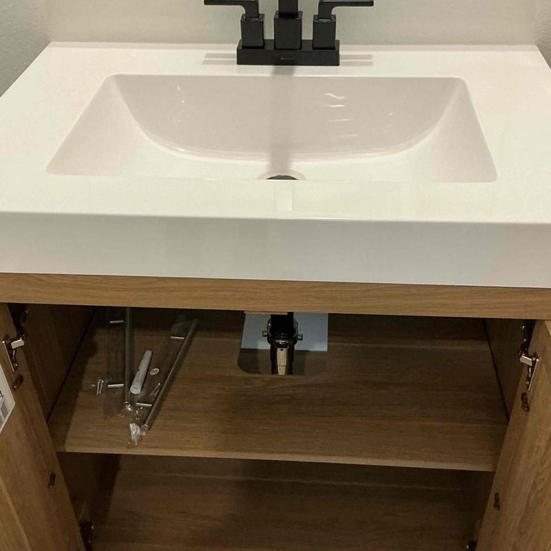 Vanity faucet installation with sink and cabinet Vanity faucet installation with sink and cabinet