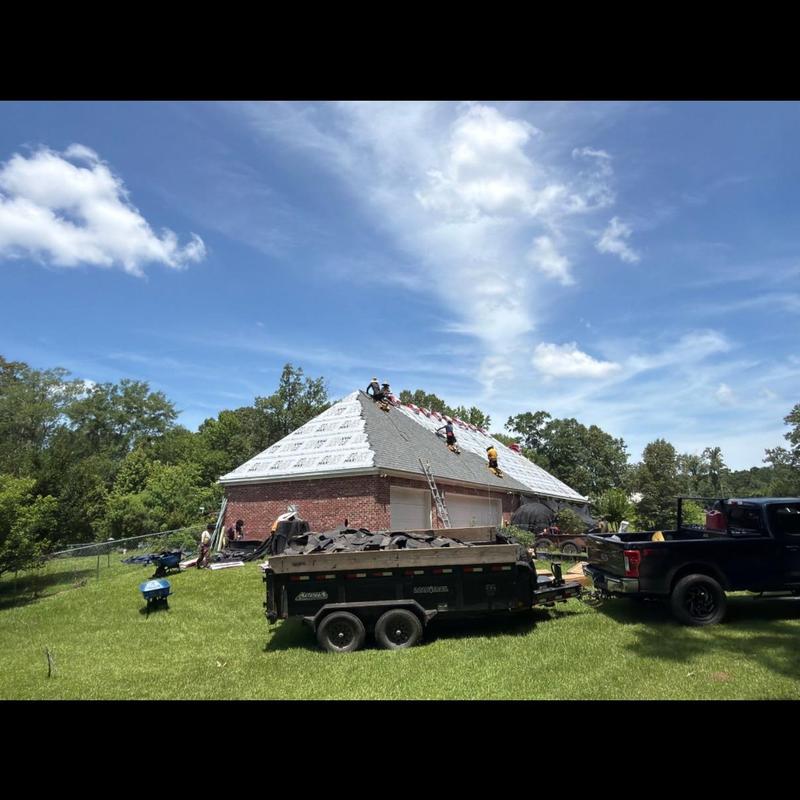 Owens Corning roof system installation on brick home