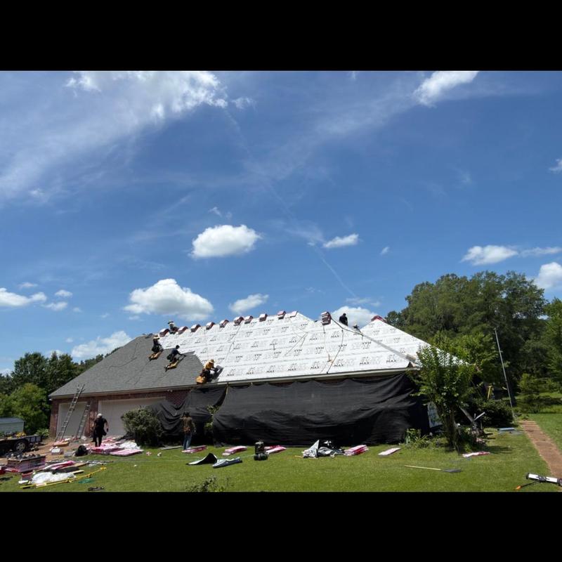 Owens Corning roofing installation on house roof