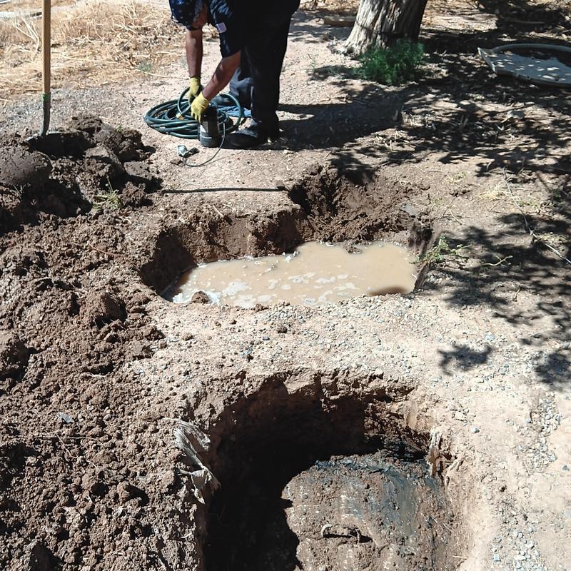 Septic tank riser installation and leach field inspection