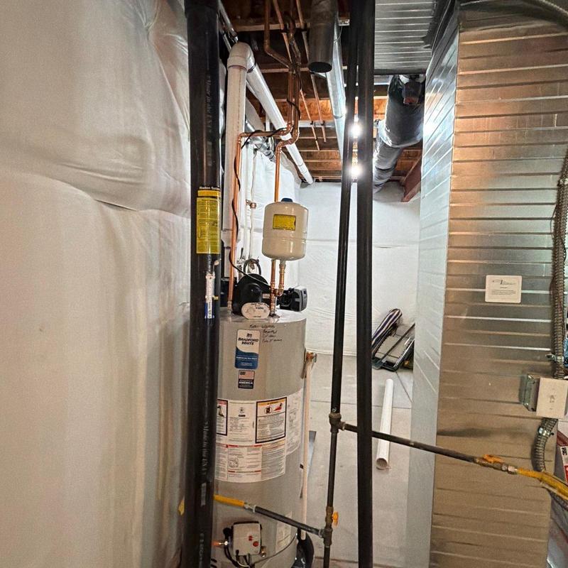 Power vent water heater with copper repiping in basement Power vent water heater with copper repiping in basement
