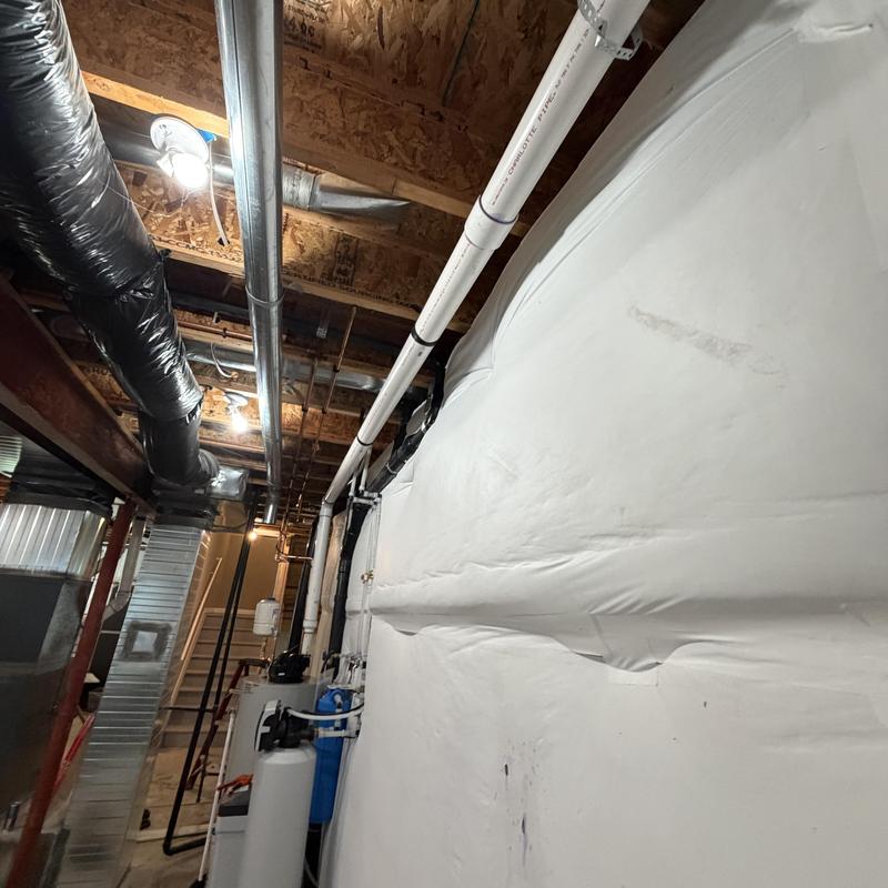 Power vent water heater piping and vent repipe in basement Power vent water heater piping and vent repipe in basement