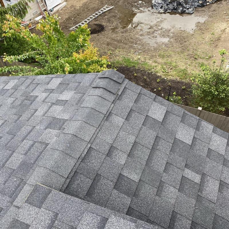 Asphalt shingle ridge caps and roof vents installation
