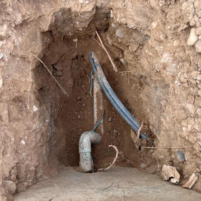 1-inch pressure regulator valve with plumbing fittings in dirt hole 1-inch pressure regulator valve with plumbing fittings in dirt hole