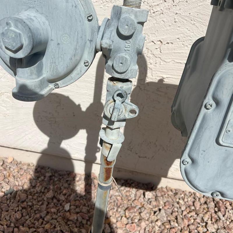 Gas line sediment trap and valve assembly outdoors Gas line sediment trap and valve assembly outdoors