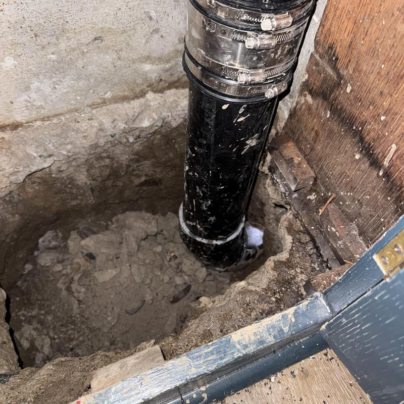 Sewer line replacement and rough backfill in basement hole Sewer line replacement and rough backfill in basement hole