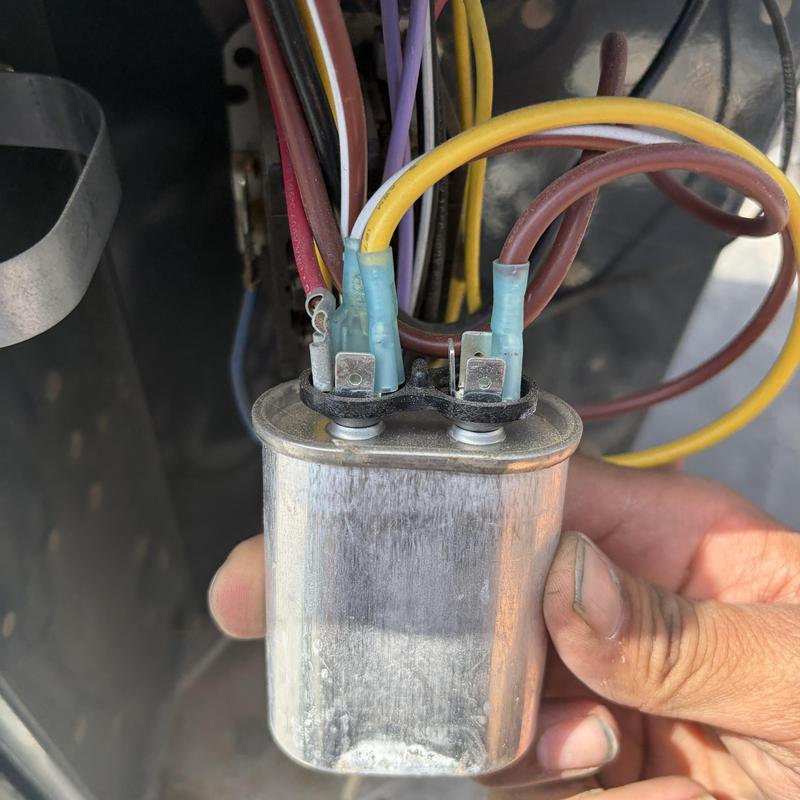 HVAC run capacitor with wiring during maintenance HVAC run capacitor with wiring during maintenance