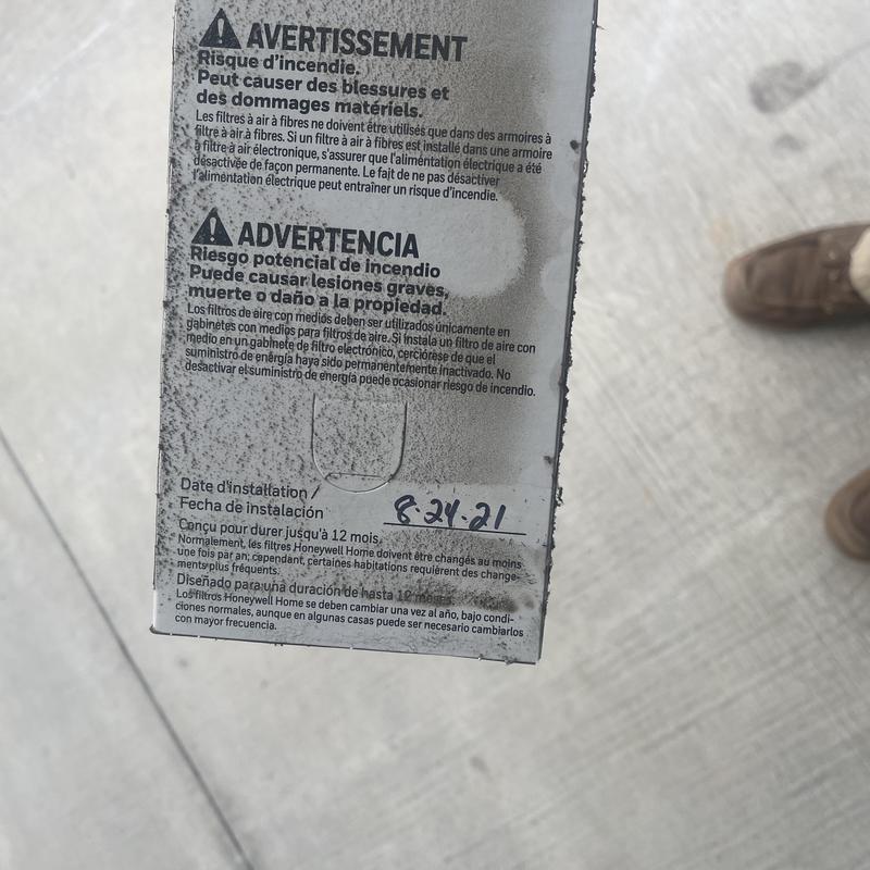 Clogged 16x20x4 air filter with installation date