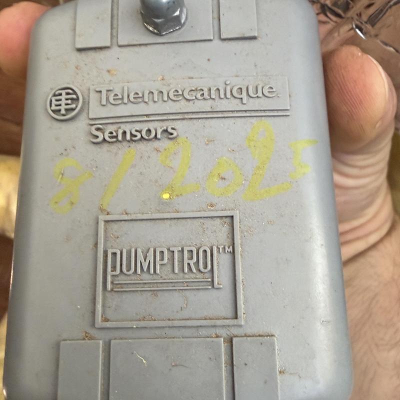 PumpTroi sensor unit held in hand with dirt marks