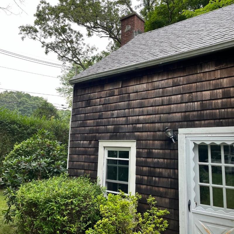 New roof shingles on wood-sided house in Stonington CT New roof shingles on wood-sided house in Stonington CT