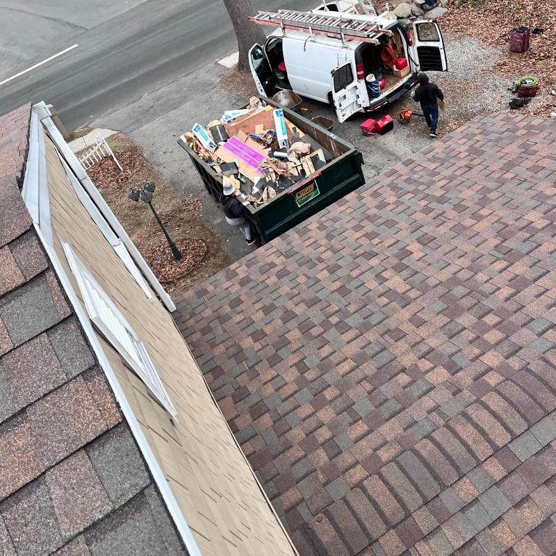 Asphalt shingle roof installation with debris removal Asphalt shingle roof installation with debris removal