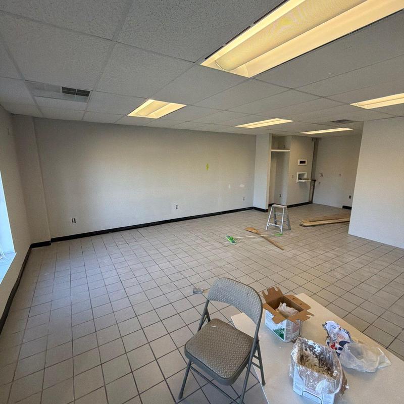 Tile flooring installation and room renovation in progress