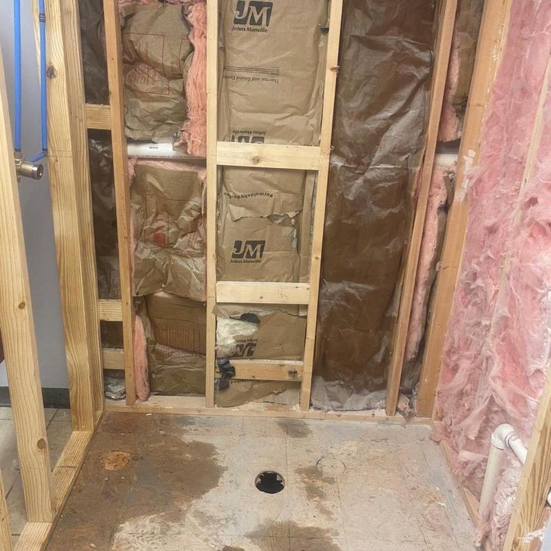 Bathroom drain plumbing rough-in with wall insulation