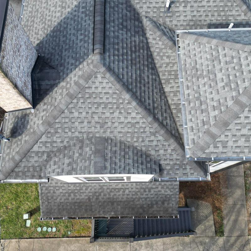 Asphalt shingle roof with hail damage inspection