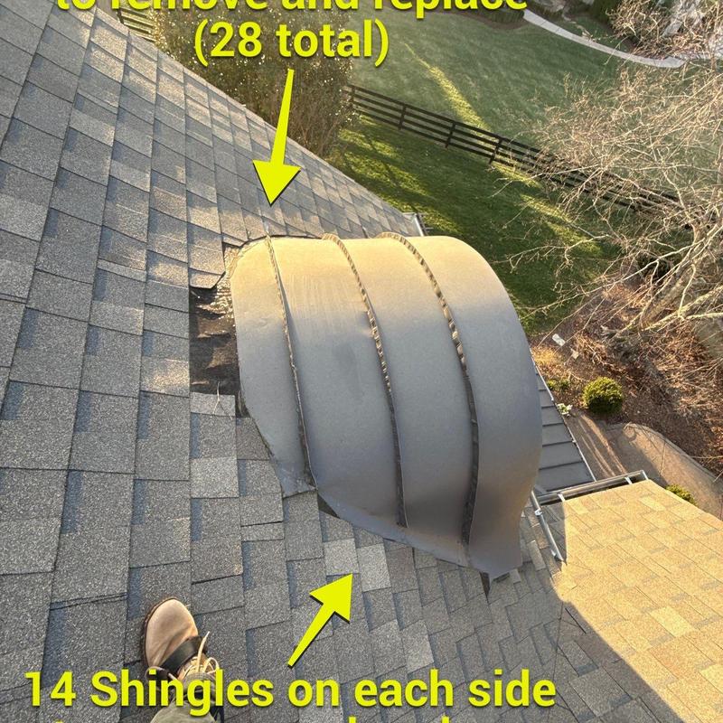 Asphalt shingles with damage around roof vent