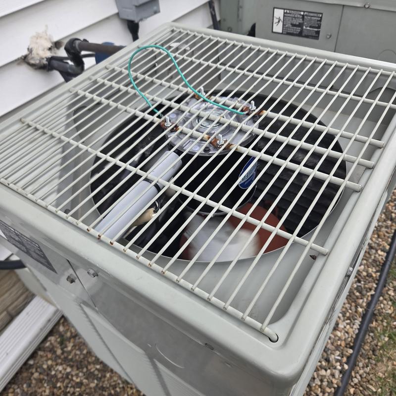 Condenser fan motor replacement on outdoor AC unit