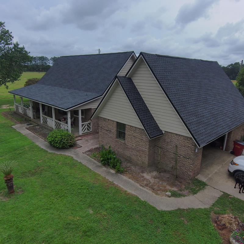 Charcoal shingle roof with black eave metal in Defuniak Springs Charcoal shingle roof with black eave metal in Defuniak Springs