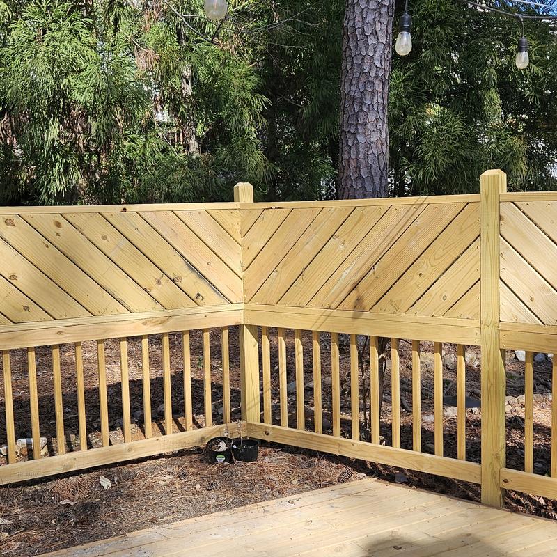 Wooden privacy fence corner installation outdoors Wooden privacy fence corner installation outdoors