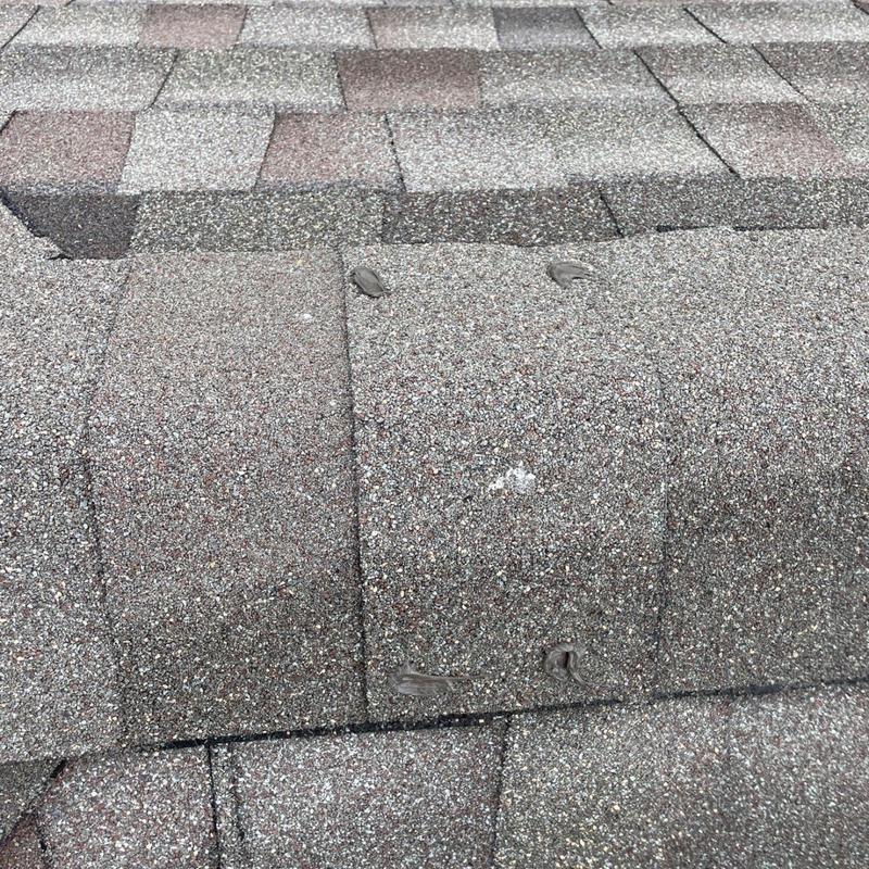 Roof shingles with sealed exposed fasteners and repairs